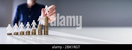 Minimum Wage Salary Compensation And Insurance Coins Stock Photo - Alamy