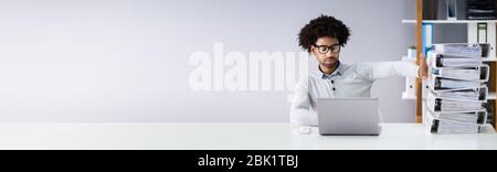 Accountant Using Software For Invoices And Tax Documents. Digital Transformation Stock Photo