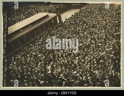 Huge crowd of baseball fans watching baseball scoreboard during World Series game in New York City Stock Photo