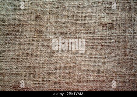 Aged vintage and weathered cloth background texture. Old damaged brown rough texture Stock Photo