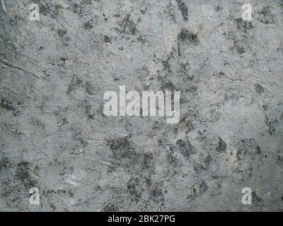 Old gray painted concrete with black scuffed rustic background, horizontal orientation, top view. Copy space. Stock Photo