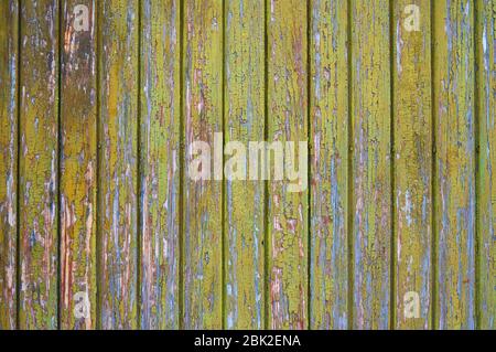 Old wooden shield painted in green. Stock Photo