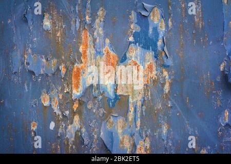 blue chipped paint , rusty textured metal background Stock Photo