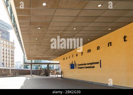 Text on a wall at the entrance to the Berlaymont building, the headquarters of the European Commission, located on the Schuman roundabout in Brussels. Stock Photo