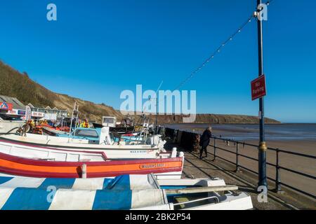 Filey Bay, promenade, boats, beach, autumn, North Yorkshire coast, England, UK Stock Photo