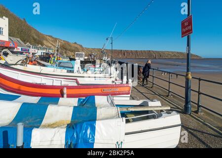 Filey Bay, promenade, boats, beach, autumn, North Yorkshire coast, England, UK Stock Photo