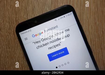 Google Assistant website displayed on smartphone Stock Photo