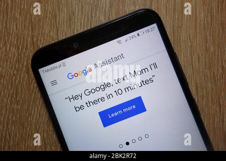 Google Assistant website displayed on smartphone Stock Photo