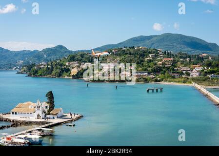 Easyjet aeroplane coming in to land across the causeway at Corfu International Airport. Stock Photo