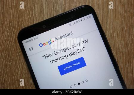 Google Assistant website displayed on smartphone Stock Photo