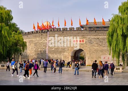 Qufu, Shandong province / China - October 13, 2018: Tourists visit Qufu walled city, UNESCO world heritage site where Temple of Confucius is located i Stock Photo