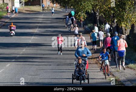 Johannesburg, South Africa. 1st May, 2020. Local people enjoy outdoor activities in Johannesburg, South Africa, May 1, 2020. South Africa started easing lockdown restrictions from Friday. Credit: Chen Cheng/Xinhua/Alamy Live News Stock Photo