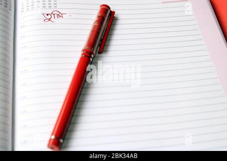 Pen on open notebook. Open diary page. Love letter concept. Stock Photo