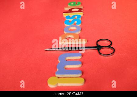 Self belief and positive concept, scissors cut off the word Impossible to read possible. From impossible to the possible. Stock Photo