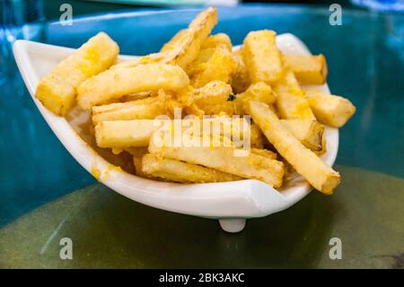 A plate of winter melon chips at a modern style Shanghai cuisine restaurant. Stock Photo