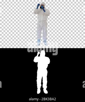 Doctor in Hazmat Suit and Gas Mask Holding Test Tube of Blood, Alpha Channel Stock Photo