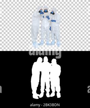 Doctors or scientists wearing hazmat suits working together on digital tablet, Alpha Channel Stock Photo