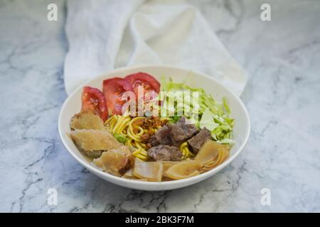 Soto Mie Bogor,traditional noodles soup from West Java ,Indonesia Stock Photo