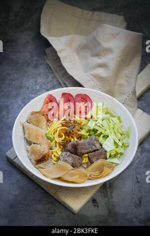 Soto Mie Bogor,traditional noodles soup from West Java ,Indonesia Stock Photo