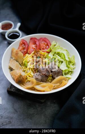 Soto Mie Bogor,traditional noodles soup from West Java ,Indonesia Stock Photo