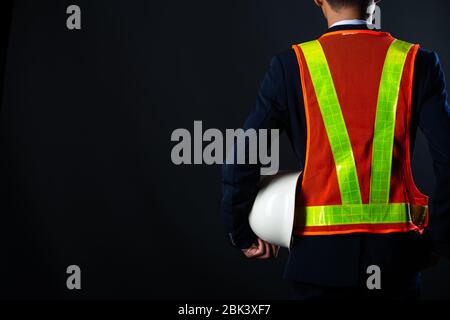 Portrait of a cheerful Young businessman construction site engineer,close up. Stock Photo