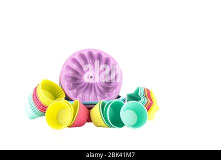 Multi-colored silicone cake baking dishes isolated on a white background. Copy space. Stock Photo