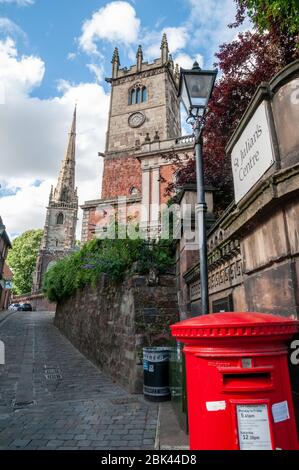 View up Fish Street with towers of St Julian's Church and Centre and Saint Alkmunds Church at the far end in Shrewsbury town in Shropshire, England. Stock Photo