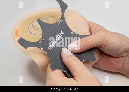 Top view on colostomy bag needed after colostomy surgery - colon cancer treatment. Ostomy bag with filter in skin color. Medical theme. Stoma bag and Stock Photo