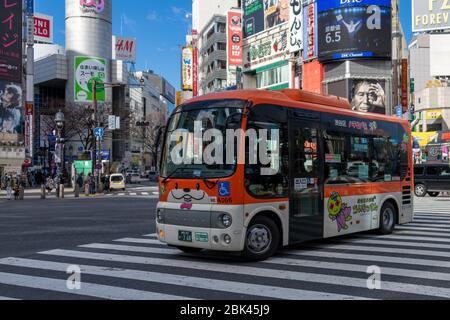 Small Bus at Shibuya Scramble Crossing, Tokyo, Japan Stock Photo