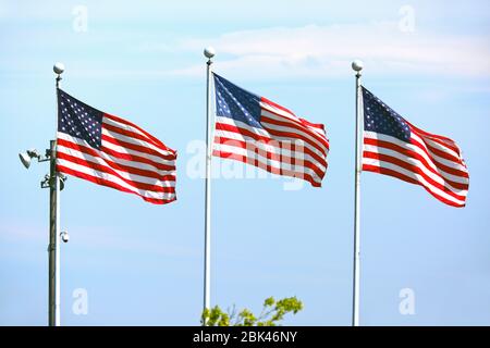 Three USA flags in a row Stock Photo - Alamy