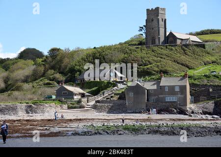 Wembury Beach near Plymouth. View from Wembury's award winning  Beach to St. Werburgh church and Marine centre at low tide. AONB. South Devon,England. Stock Photo