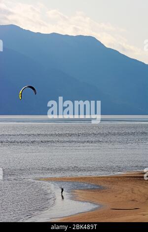 Surfer in Alaskan summer, Turn again arm Stock Photo