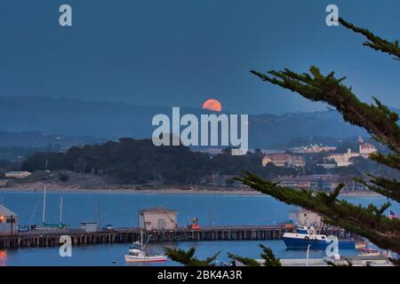 Supermoon rising over the Monterey Bay. Stock Photo