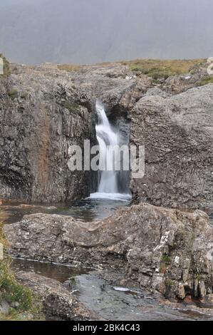 The Fairy Pools are part of a tributary of the River Brittle running down from the Cuillin Mountains near the village of Carbost in Glenbrittle on the Stock Photo