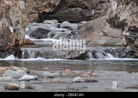 The Fairy Pools are part of a tributary of the River Brittle running down from the Cuillin Mountains near the village of Carbost in Glenbrittle on the Stock Photo