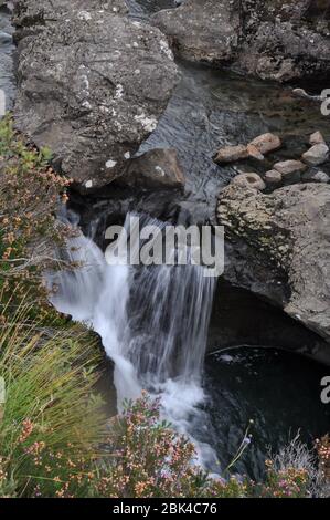 The Fairy Pools are part of a tributary of the River Brittle running down from the Cuillin Mountains near the village of Carbost in Glenbrittle on the Stock Photo