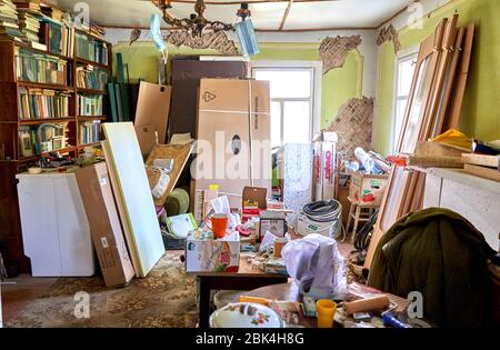 Room in old house full of stuff Stock Photo