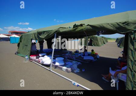 Portoviejo, Ecuador - April, 18, 2016: Tents for the refugees after 7.8 earthquake. Stock Photo