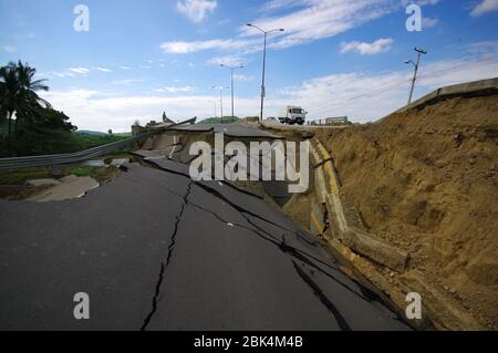 Portoviejo, Ecuador - April, 18, 2016: Asphalt cracked in road after devastating 7.8 earthquake. Stock Photo