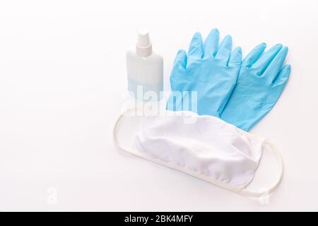 Antivirus set of items: various filtering safety face masks, sanitizer for hands Stock Photo