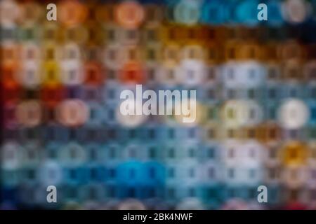 LED illuminated bokeh background on frame arrangement system. Abstract defocused illuminated backdrop with light bokeh on rectangular grid pattern. Stock Photo