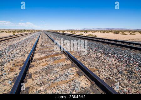 View of railway line close to Highway 15 in California, United States of America, North America Stock Photo