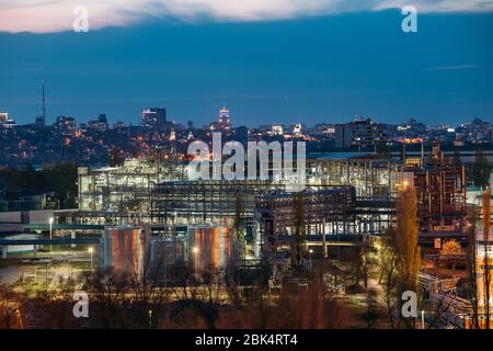 Chemical factory at night. Production of thermoplastic in Voronezh Synthetic Rubber Plant. Stock Photo