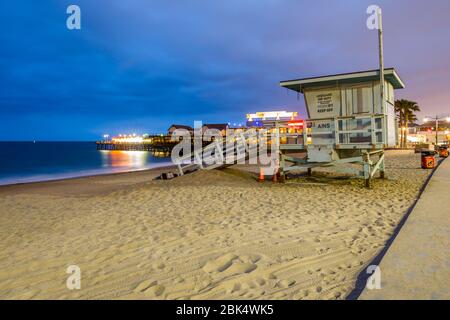 View of lifeguard tower and Redondo seafront pier at dusk, Los Angeles, California, United States of America, North America Stock Photo