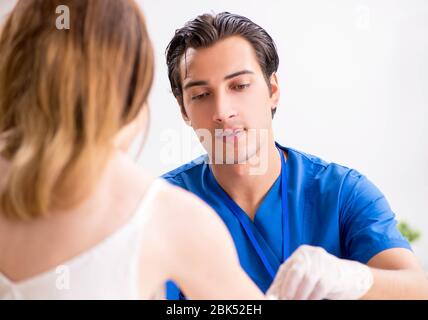 The young patient during blood test sampling procedure Stock Photo