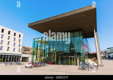 Darmstadt, Germany - April 08, 2018: Main Entrance of the Technical University of Darmstadt with unidentified people. It was the 1st German university Stock Photo