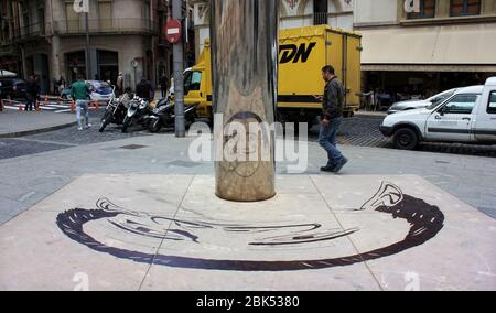 Salvador Dali mirror portrait monument in the street of Figueres, Catalonia, Girona, Spain. Taken on 16th April, 2015. Stock Photo