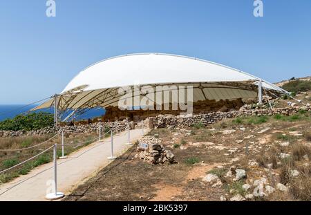 Mnajdra prehistoric temple under a protective canopy, Qrendi, Malta Stock Photo