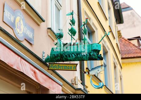 Bamberg, Germany - June 14, 2019: antique shop sign in the old town of Bamberg. Bamberg is a city in Bavaria and well known for its medieval old town Stock Photo