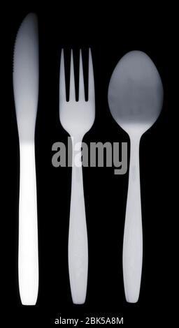 Knife fork and spoon, X-ray. Stock Photo